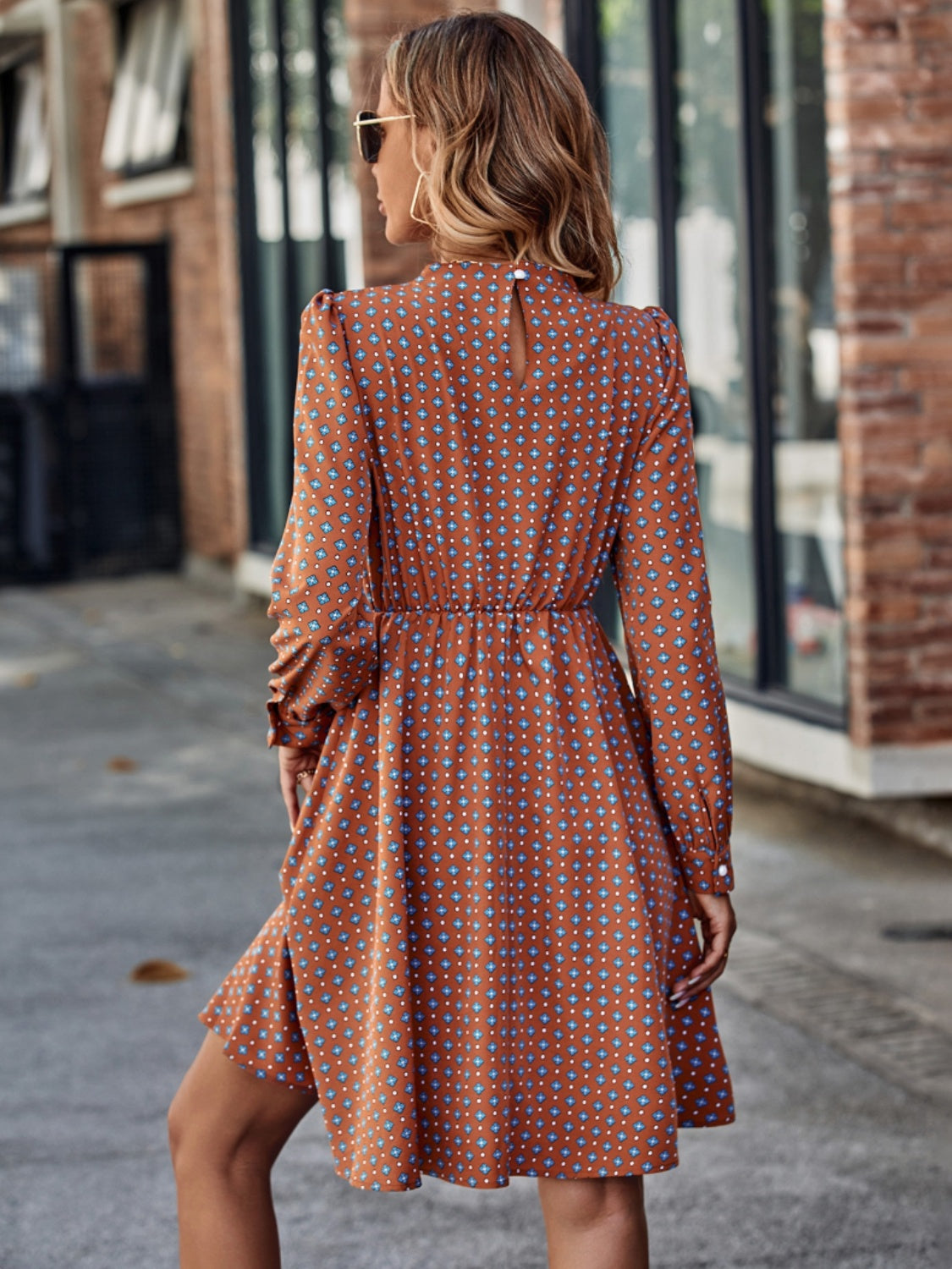 Printed Ruched Mock Neck Long Sleeve Dress - store name